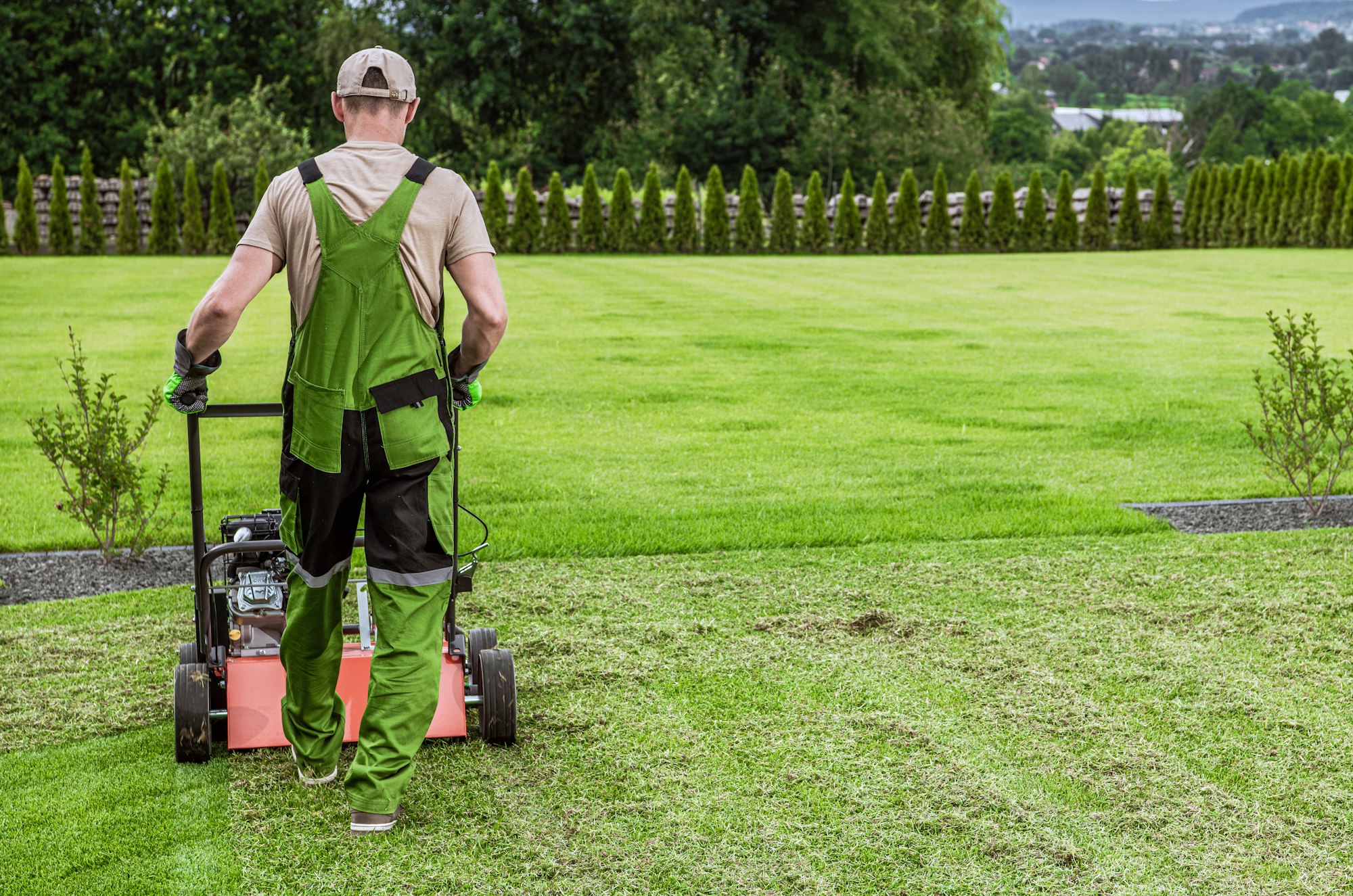 Professional gardener with Powerful Lawn Aerator