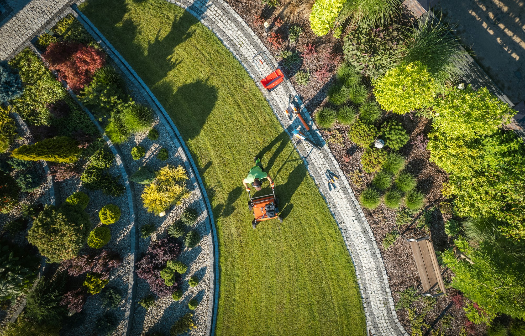 Landscaping Worker Lawn Aerating Using Aerator